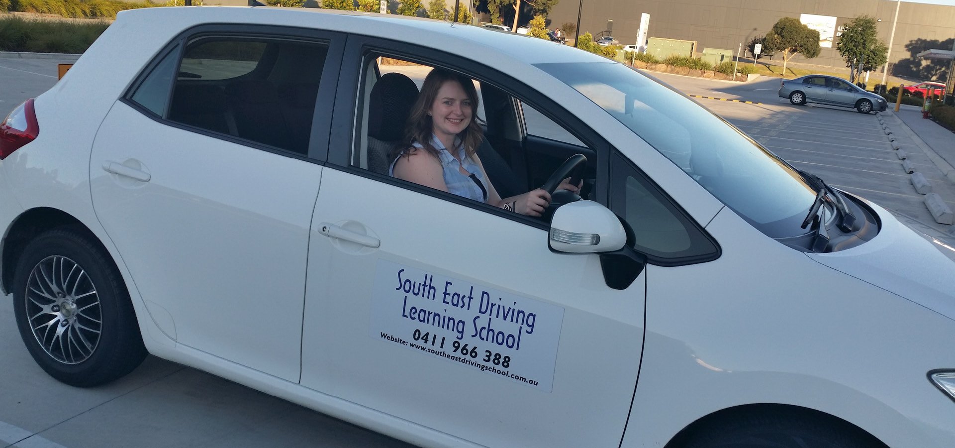 Happy student with P plates